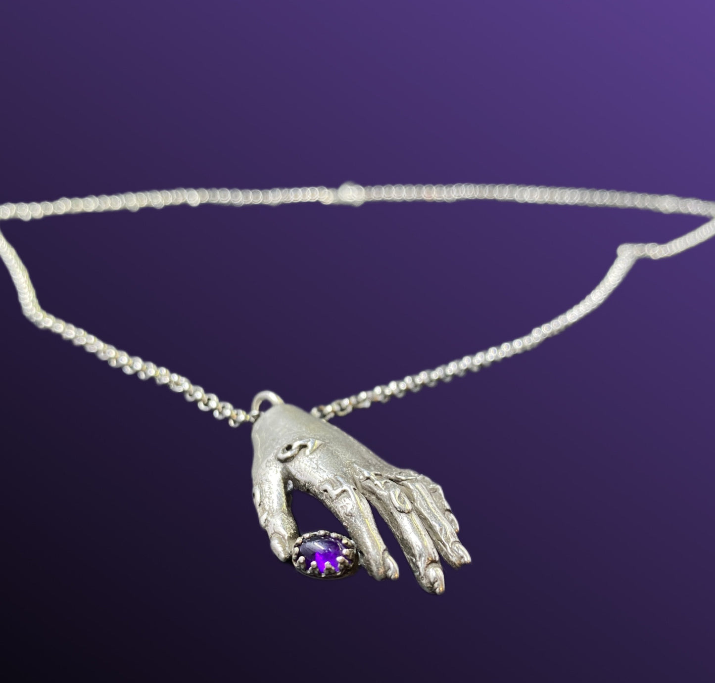 Silver Alchemist's Hand Pendant with Amethyst