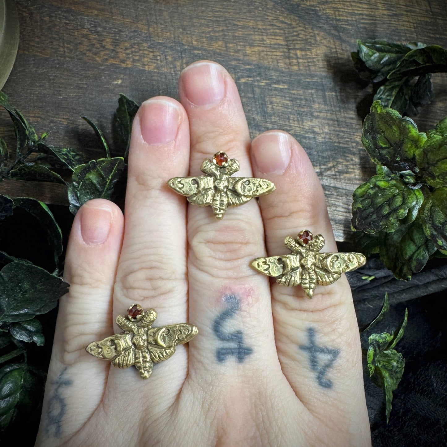 Lucille: Brass and Garnet Moth Ring